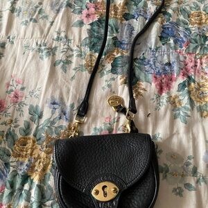 Dooney & Burke small shoulder purse..strap on top is cracked but still useable